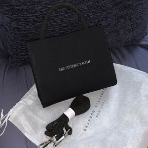 Brandon Blackwood black canvas ESR tote.